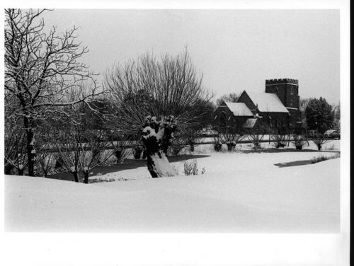 St. Michael's Church in the snow at the Open University Walton Hall campus.