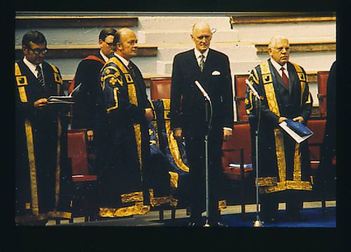 Senior Open University Staff at a Graduation Ceremony