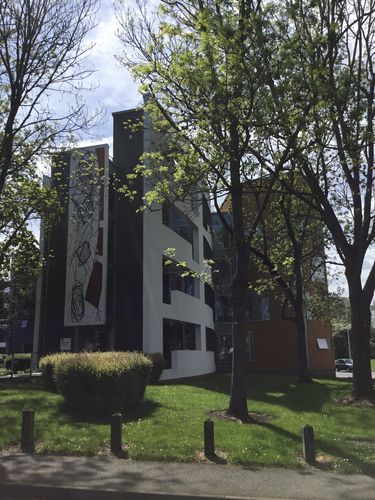 External view of the Stuart Hall Building on the Open University campus, Milton Keynes. Named after Professor Stuart Hall (1932-2014), Head of Sociology at The Open University. The building was built in 2002 and houses the Department of Education and Language Studies.