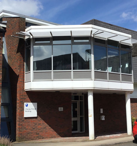 External view of the Charles Pinfold Building on the Open University campus in Milton Keynes. The Pinfold family owned the manor of Walton (the location of the Open University campus) for much of the eighteenth and nineteenth centuries. Captain Charles Pinfold added the square front section of Walton Hall in 1830.
The Charles Pinfold Building was originally called Offices 6 in 1996 and was renamed the Charles Pinfold Building in 2010. New Science and Technology workshops were added in 1997.