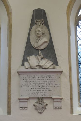 Memorial in St Michael's Church, Walton Hall, to Sir Thomas Pinfold LLD (1638-1701) his wife Elizabeth (died 1724) and his mother, also named Elizabeth. Thomas was the first of the Pinfold family to own Walton Hall which he purchased in 1698. His descendants continued to own the estate until 1902. The memorial is by renowned sculptor Joseph Nollekens who created it several years after the death of Sir Thomas on the bequest of his family. 