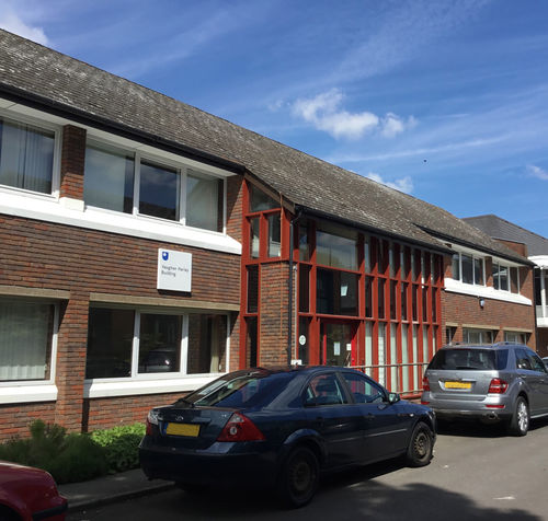 External view of the Vaughan Harley Building on the Open University campus in Milton Keynes. Named after Dr Edward Vaughan Berkeley Harley (1864-1923) who acquired Walton Hall around 1904. The Building was originally opened as the North Spur Building in 1985 and was renamed after Vaughan Harley in 2010.