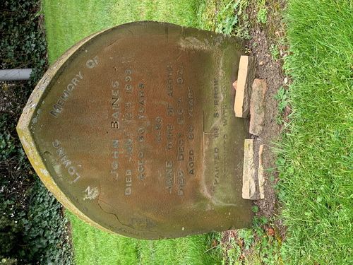 The grave of John and Jane Baines in St Michael's churchyard, Walton Hall, photographed in 2021.  