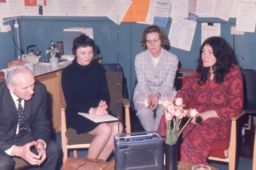 view image of Students listening to a radio programme at an OU study centre