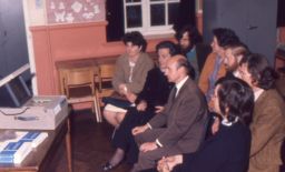 view image of Students watching TV at an OU study centre