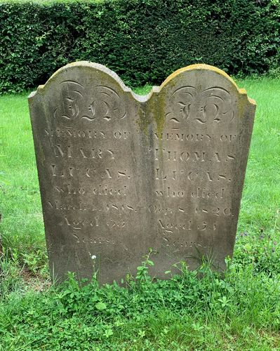 The grave of Mary and Thomas Lucas in St Michael's churchyard, Walton Hall, photographed in 2021.
