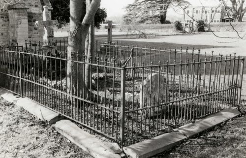 The grave of Captain Charles Pinfold and his sister Arabella Pinfold in St Michael's churchyard, Walton Hall, photographed in 1986. The simple headstone stands in the foreground of the family plot contained within iron railings. 