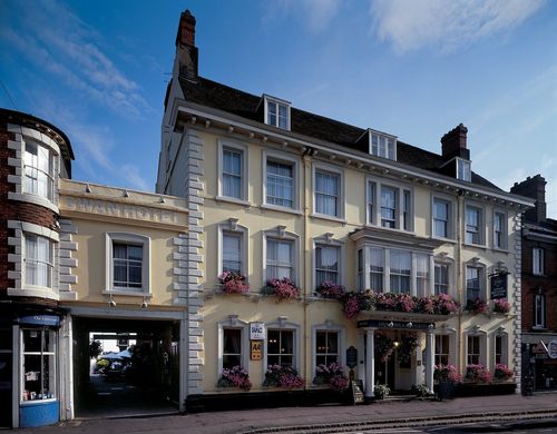 The historic Swan Inn in Newport Pagnell. Now called the Swan Revived Hotel, the seventeenth century coaching inn was used for events such as estate auctions in the area. It was also a frequent meeting place for local notables including one in April 1818 to establish a Savings Bank in Newport Pagnell, attended by Captain Charles Pinfold of Walton Hall.