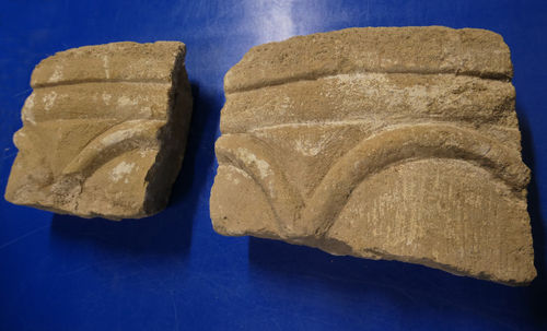 Pieces from a twelfth century stone font recovered from St Michael's Church, Walton Hall during restoration by The Open University in the 1970s. These pieces, together with several more, are archived at Milton Keynes Museum. 