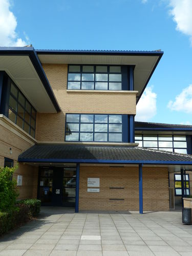 External view of the entrance to the Philip Sully Building on the Open University east campus in Milton Keynes. Named after OU student Philip Sully who, by 2006 had completed 61 OU modules and gained a Masters, PhD and two undergraduate degrees.