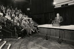 view image of John Horlock speaking at an OU event