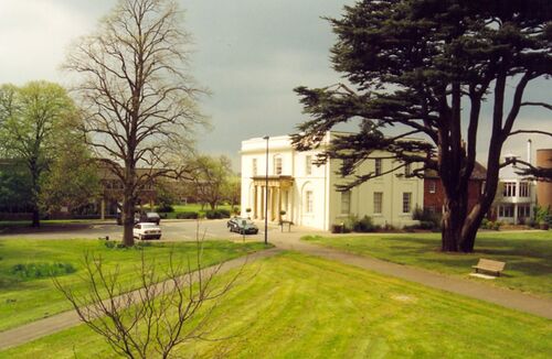 Walton Hall beneath a stormy sky