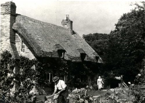 Jennie Lee and Aneurin Bevan's home Lane End Cottage near Reading where they lived in the 1940s. Jennie's parents can be seen in the garden.  