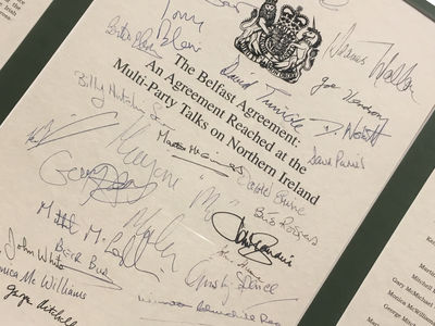 This is a picture of the front cover of the Belfast Agreement (more commonly known as The Good Friday Agreement), signed by participants to the agreement.