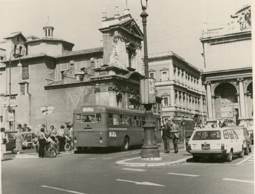 The OU Students Association bus with other traffic in Rome.