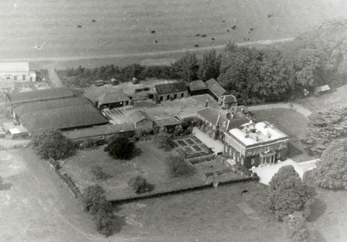 This aerial view of the Walton Hall estate was taken in the mid 1960s. The photograph clearly shows many of the farm buildings attached to the Hall as well as the Mulberry Lawn next to the Hall. 