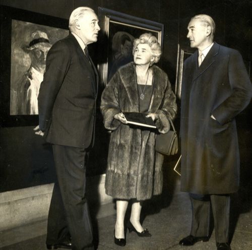 Jennie Lee photographed on her first official visit to the Tate Gallery as Minister for the Arts, in 1964. She is pictured with Niall MacDermott (Financial Secretary to the Treasury) and Colin Anderson (Tate Trustee). 
