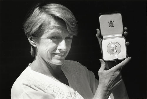 Doreen Massey holding the Victoria Medal