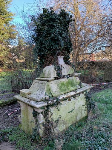 Tomb of Dr Charles Pinfold (1677-1754) and his wife Renea (1683-1753) in St Michael's churchyard at Walton Hall. Charles inherited the Walton estate from his father Thomas in 1701. The tomb was encased in ivy and was uncovered in February 2022.