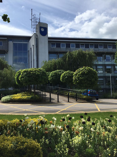 A view of the Berrill Building, named after Sir Kenneth Berrill (1920-2009) who served as the OU Pro-Chancellor and Chairman of the Committee from 1983 to 1996.